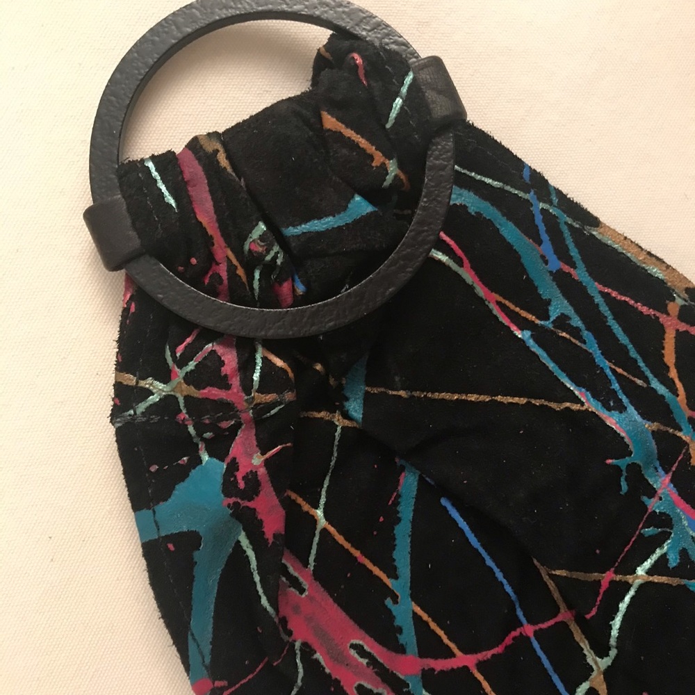Vintage hand painted belt on black suede.